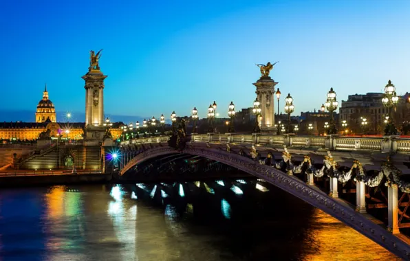 Картинка свет, мост, город, река, Франция, Париж, вечер, освещение, фонари, Сена, Paris, архитектура, France, Мост Александра …